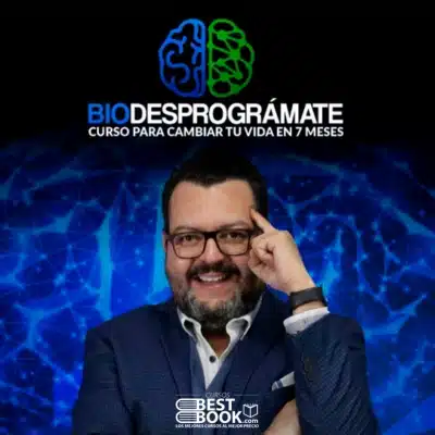 Fernando Sanchez impartiendo el curso de Biodesprogramación, mostrando un diagrama de la conexión entre mente, emociones y cuerpo en una pizarra.